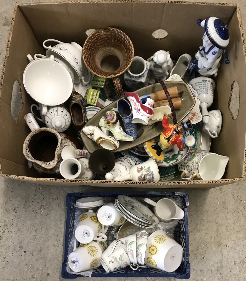 A box of assorted ceramics to include miniature shoes, bells and part tea sets.