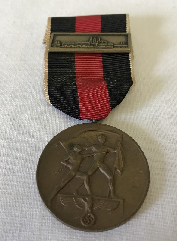 A German Czech Medal and Prague bar.