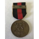 A German Czech Medal and Prague bar.