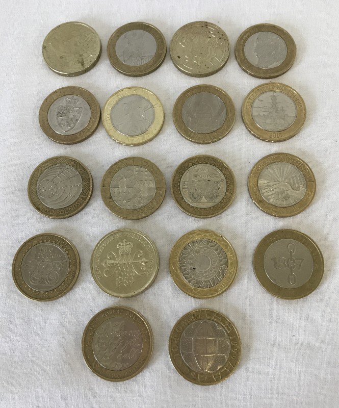 A collection of 18 different design £2 coins.