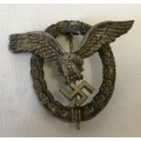A German WWII pilots badge made by "Assman", stamped A.