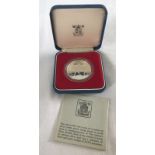 A cased 1977 silver proof Jubilee crown.