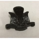 Para interest. A plastic Canadian Para badge (lugs a/f).