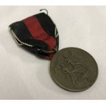 A German WWII Czech Annexation medal.