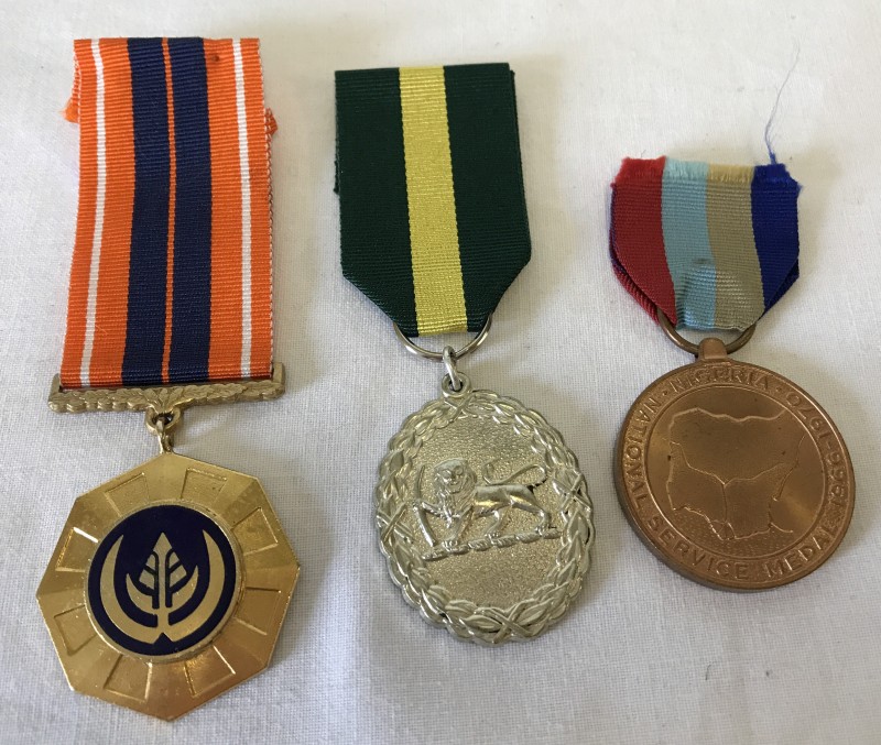 3 Africa medals to include Territorial, National Service medal.