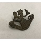 A WWI Newfoundland Regt. Small cap badge.