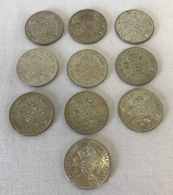 A collection of 10 pre 1947 2 shilling coins.