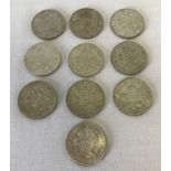 A collection of 10 pre 1947 2 shilling coins.