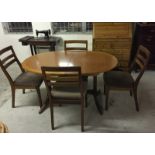 A Nathan extending oval dining table and 4 chairs.