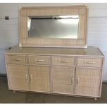 Cane sideboard with 4 doors & 4 drawers with matching mirror.