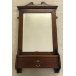 A c1930's mahogany hall wall mirror.