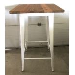 A modern poseur / bar table with pressed steel frame and solid elm wooden top.