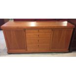 A large solid cherry wood sideboard with 2 cupboards & 4 drawers.