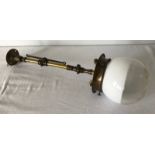 A brass inverted gas burner lamp by CH & Co.