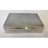 A silver lined wooden cigarette box engraved to front and presented to Major Pilkington. RASC.