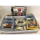 34 boxed diecast cars & vans.