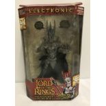 A boxed set of The Lord Of The Rings, The Fellowship Of The Ring Electronic Sauron figure.