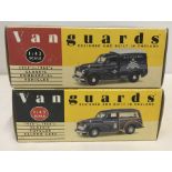 2 boxed Vanguards Morris Minors.