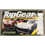 A boxed Top Gear Laps Scalextric set.