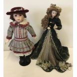 2 boxed Franklin Mint Heirloom dolls.