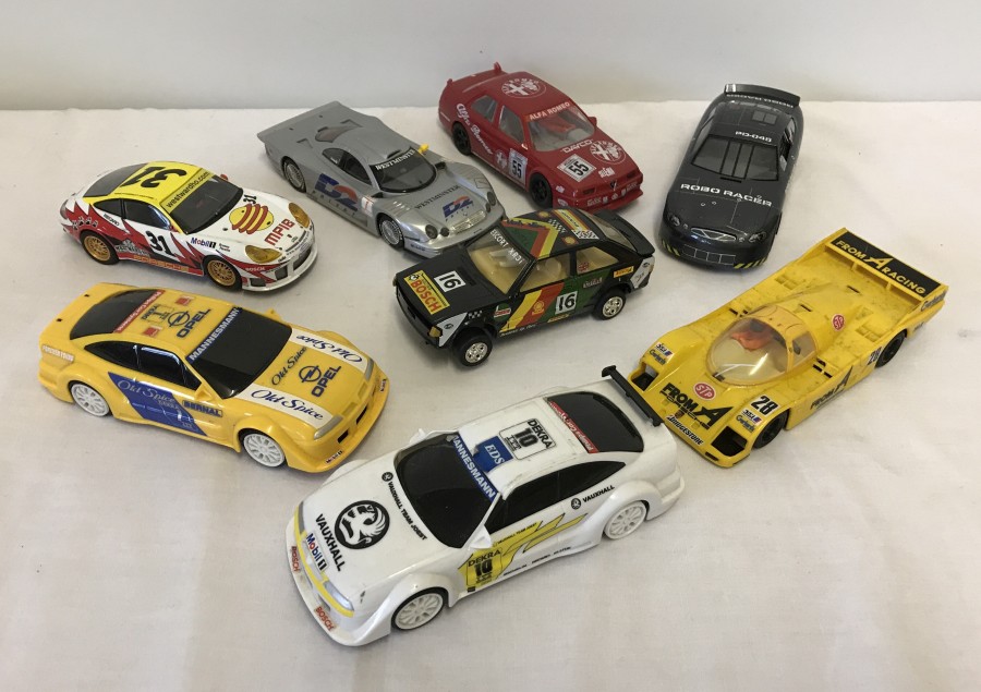 8 unboxed Scalextric slot cars.
