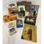 A box of Wallace & Gromit collectables.