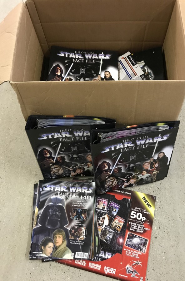 A box containing the full set of "The Official Star Wars Fact File".