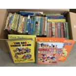 A box of vintage Enid Blyton books.