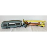 2 play worn transporter lorry toys.