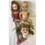2 vintage dolls together with a ceramic Heubach Köppelsdorf dolls head with hair.