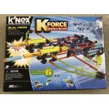 A boxed K'Nex Dual Cross building set.