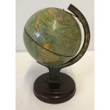 A c1950's Chad Valley tinplate globe.