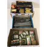 3 boxes of OO gauge model railway track, trucks, and accessories.
