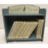 A 1960's Beatrix Potter 'Peter Rabbit's Book Shelf' and 16 books (all 1960's).