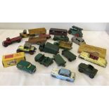 A box of vintage play worn Dinky cars & vehicles.