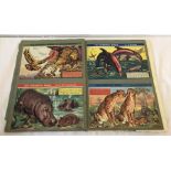 A vintage scrap book containing a quantity of animal pictures and facts from "This Wonderful World".