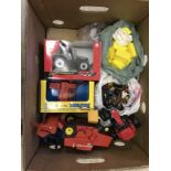 A box of Britains & Ertl farm vehicles, with plastic farm animals & figures.