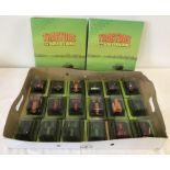 A box containing 18 boxed Hachette tractors scale 1:43.