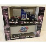 A boxed Revell 1:24 scale Peterbilt 359 truck and box trailer.