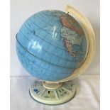 A vintage tinplate children's globe circa 1960's.