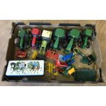 A box of diecast tractors, accessories and a tin of plastic farm figures & animals.