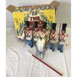 A boxed c1960's Marx 'The Big Parade' battery operated marching soldiers.