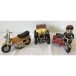3 motorbike and car toys.