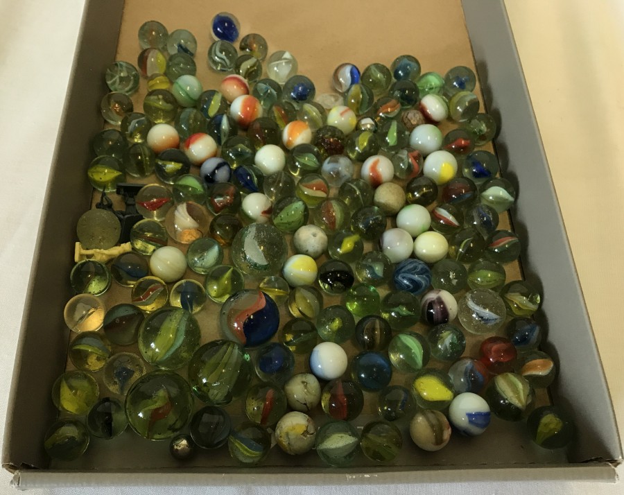 A tub of glass marbles.