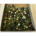 A tub of glass marbles.