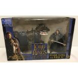 A boxed set of The Lord Of The Rings, The Return Of The King figure set.