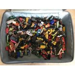 A suitcase of mixed play worn diecast.