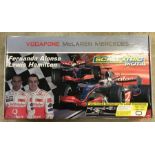 A boxed McLaren Mercedes Scalextric Digital set.