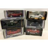 6 boxed 1:24 scale diecast cars