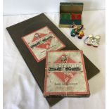 A quantity of vintage toys comprising Monopoly board game, Guinness playing cards and wind up toys.